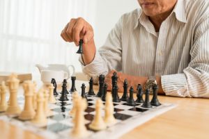 Senior Playing Chess