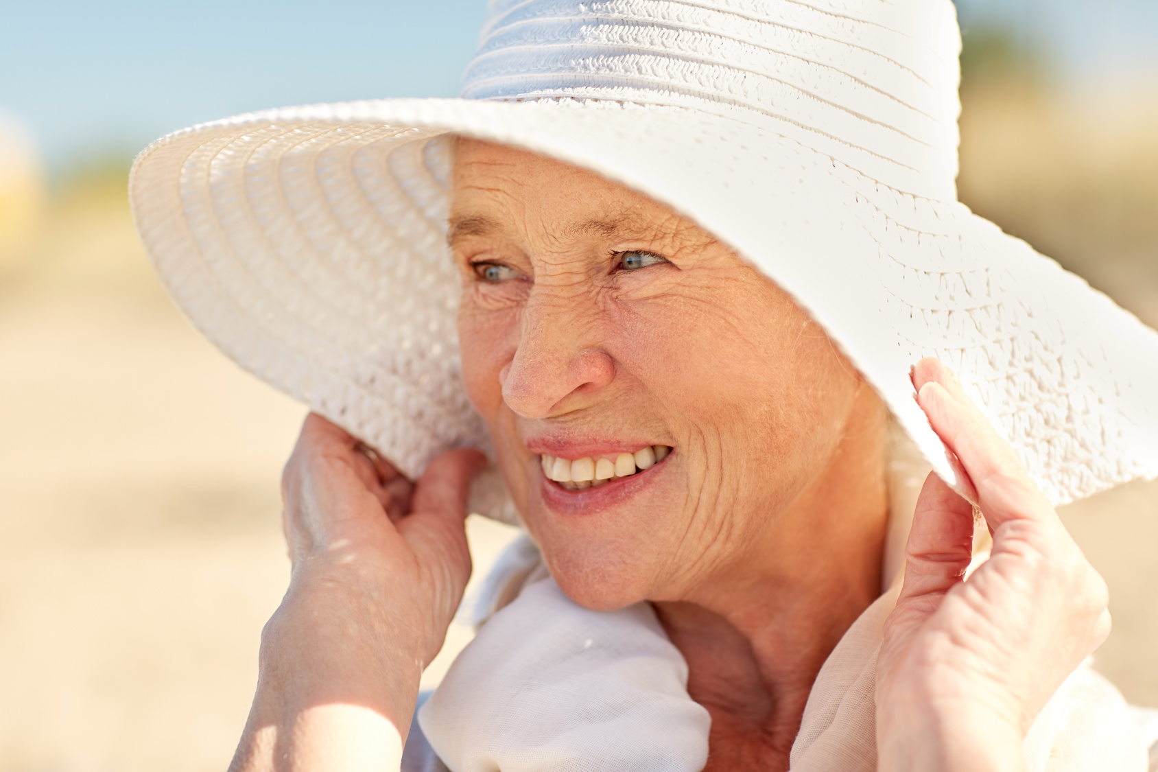 Protecting seniors from sun with hats