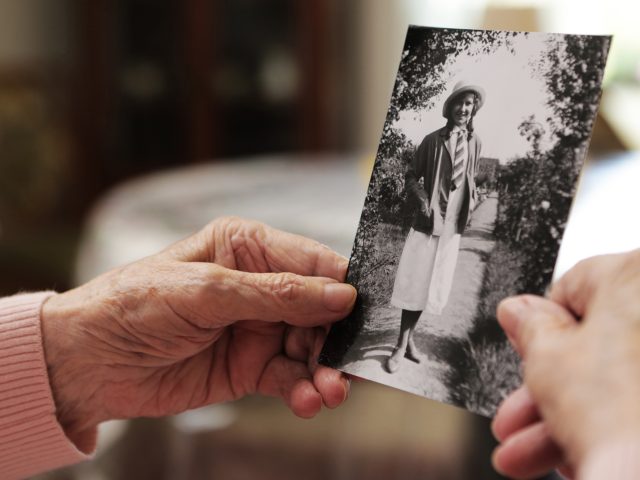 Dementia Patient Reminiscing with Photo