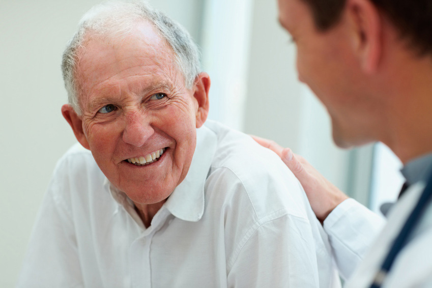 Senior Citizen Man Talking to Doctor